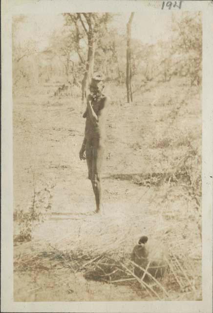 A woman standing in an open area