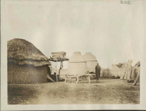 Grain storage pots on platforms