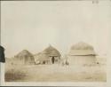 Huts and grain storage pots