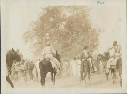 Great assembly for prayer, men on horseback