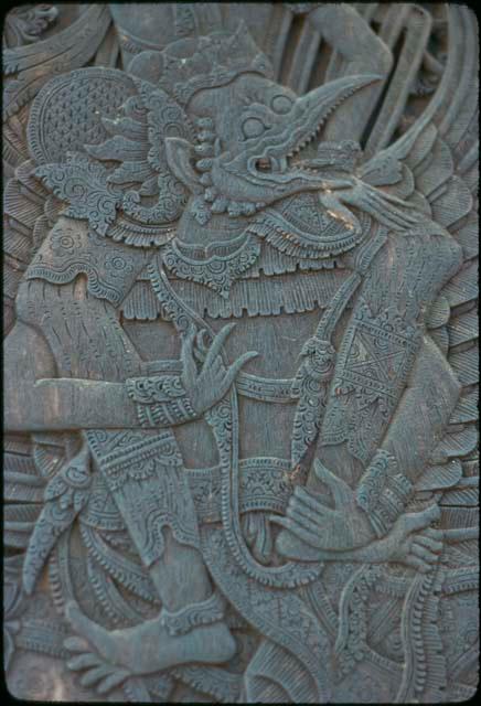 Figure of Garuda on carved door at Besakih Temple