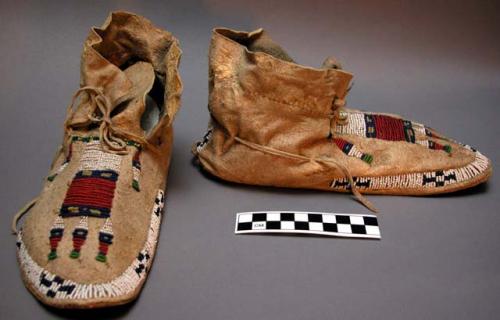 Moccasins, ornamented with beads