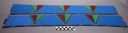 Pair of shirt strips with blue bead background