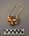 Miniature ceramic canteen with painted design, on braided fiber cord, signed Nampeyo Koo-Loo
