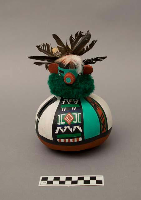 Talavai kachina with gourd body (A) and cork head (B)