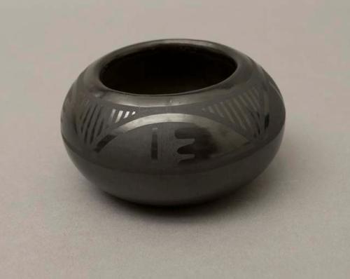 Black-on-black bowl:  geometric motif