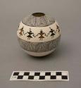 Polychrome-on-white Seed Jar:  geometric and figure motif