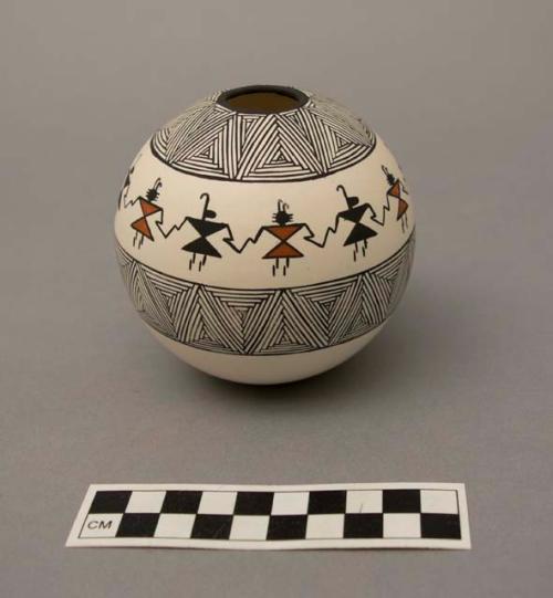 Polychrome-on-white Seed Jar:  geometric and figure motif