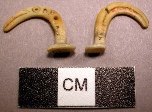 2 bone or ivory hooks