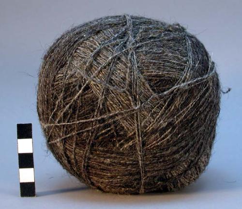 Ball of grey or black yarn