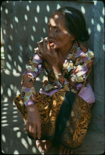 Woman chewing betel nut