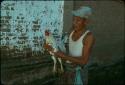 A man and his rooster for cockfighting