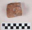 Rim potsherd with effigy lug - red on red ware