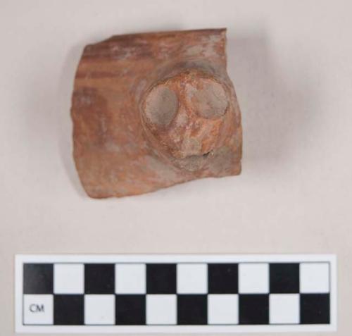 Rim potsherd with effigy lug - red on red ware