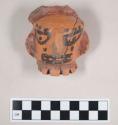 Polychrome pottery lug in form of human face