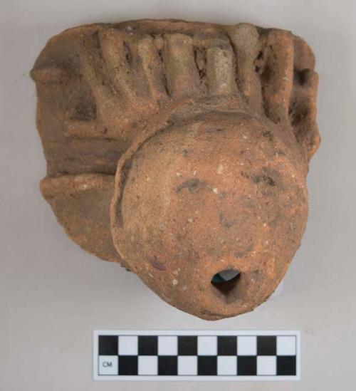 Pottery effigy lug