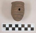 Pottery lug with incisions and perforations