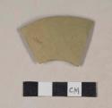 Green bodied earthenware body sherd, undecorated, wheel thrown