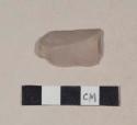 Chipped stone, flint blade, with polishing along one edge