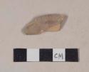 Red bodied earthenware body sherd, with red slip, wheel thrown