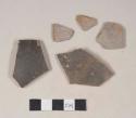 Red bodied earthenware body sherds, with brown slip, wheel thrown