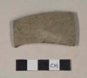 Gray bodied earthenware body sherd, with green slip, wheel thrown