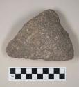 Ground stone vessel fragment