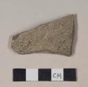 Buff bodied earthenware body sherd, with black and green speckled slip, wheel thrown; crossmends with 39-18-60/21811