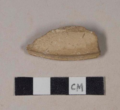 Buff bodied earthenware rim sherd, unslipped