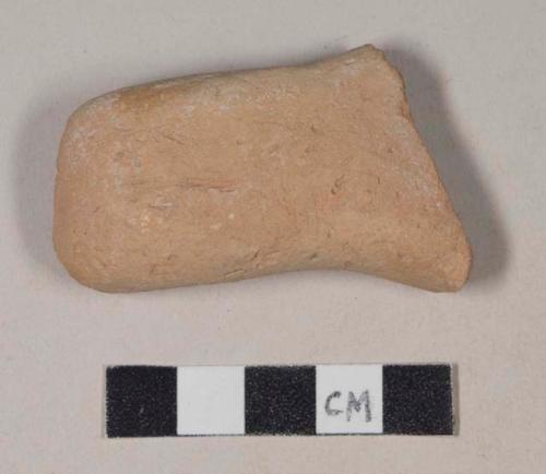 Coarse red bodied earthenware handle sherd, unslipped