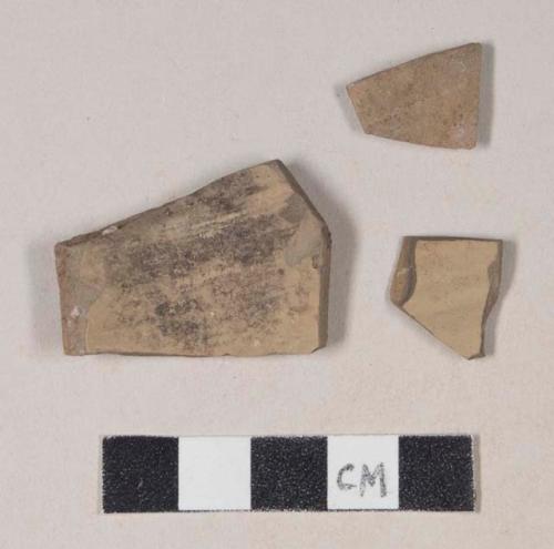 Brown bodied earthenware body sherds, with brown slip, wheel thrown