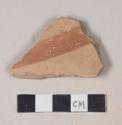 Coarse red bodied earthenware body sherd, with red slipped stripes