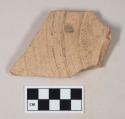 Coarse red bodied earthenware body sherd, with buff slip and incised lines