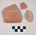 Red bodied earthenware rim sherds, with red slip, wheel thrown