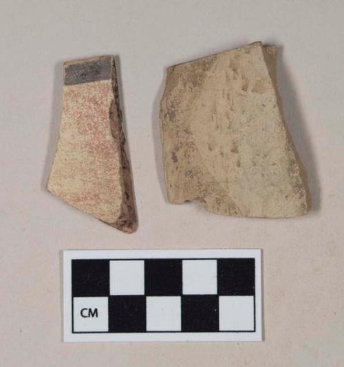 Red bodied earthenware rim sherds, with buff slip and black slipped stripes, wheel thrown