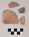 Red bodied earthenware body sherds, with black slipped stripes