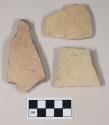 Coarse buff bodied earthenware body sherds, unslipped