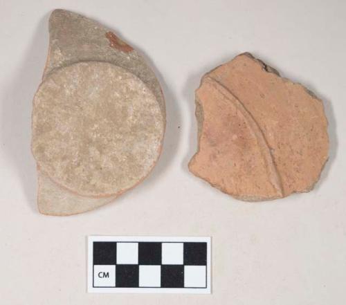 Coarse red bodied earthenware base sherds, unslipped, reduced core