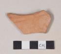 Red bodied earthenware body sherd, with buff slip on one side and red slipped stripes on the other