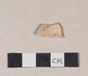 Unglazed, buff bodied coarse earthenware body sherd