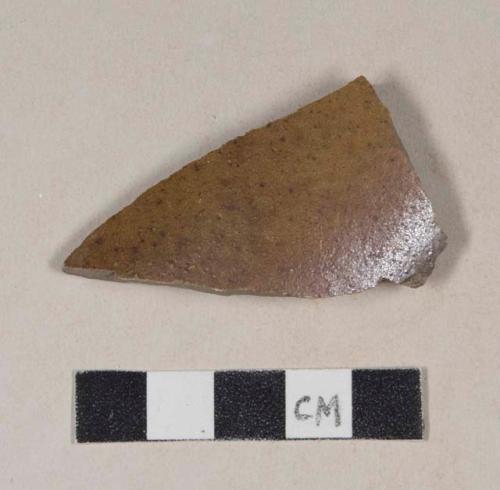 Gray bodied, brown glazed stoneware body sherd