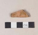 Undecorated lead glazed redware base sherd