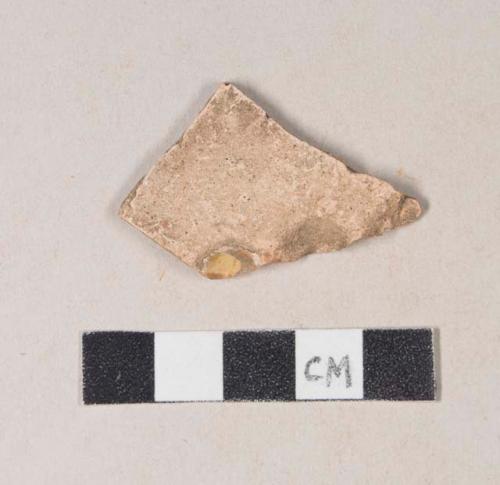 Staffordshire slipware rim sherd, with coggled rim