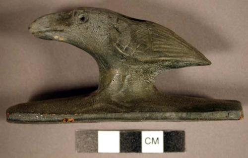 Cast pipe in the shape of a heron