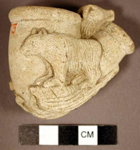 Ground stone pipe, deer and bear figures