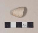 Smoked pipe bowl fragment, with possible incised line around the rim