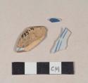 Blue hand painted tin glaze earthenware body sherds; three sherds crossmend