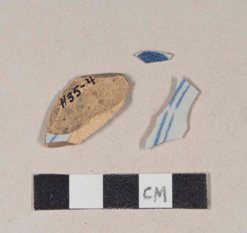 Blue hand painted tin glaze earthenware body sherds; three sherds crossmend