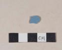 Blue glazed refined earthenware body sherd, likely factory decorated slipware