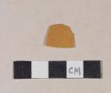 Orange-slipped refined earthenware body sherd